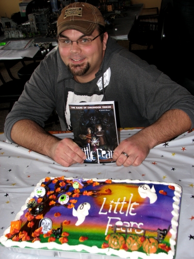 Jason L Blair with Little Fears Sheet Cake | Photo by Monica Valentinelli